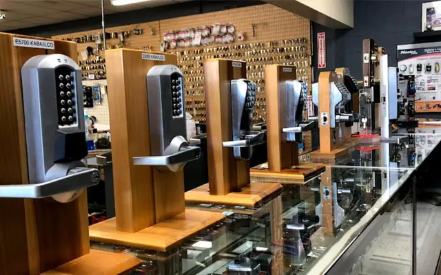 Commercial lever locks and keypads on display in a showroom