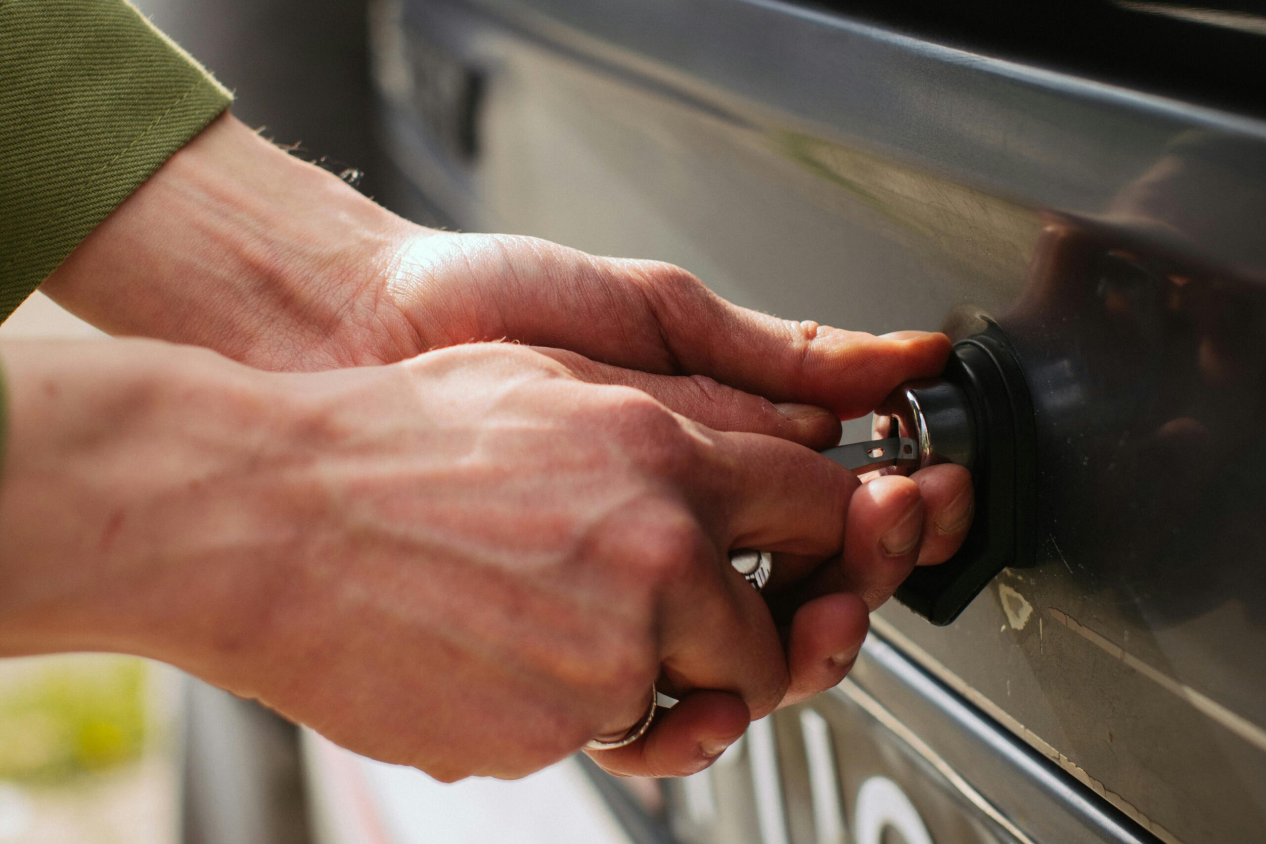 Automotive locksmith providing vehicle trunk access