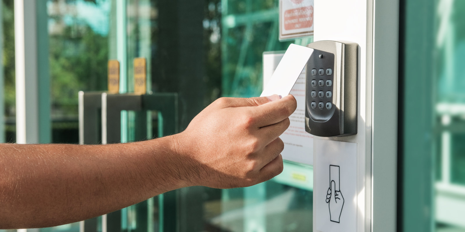 Credential card being presented to a commercial access reader
